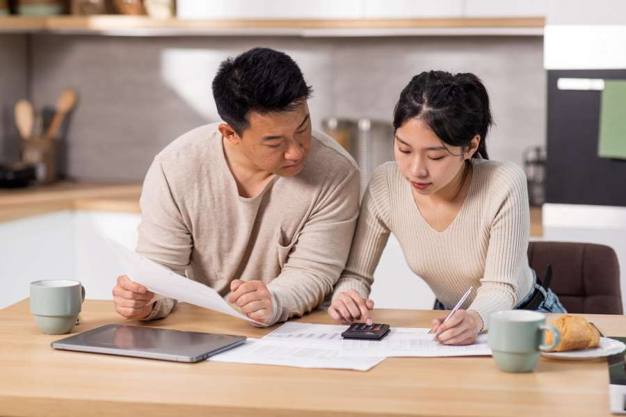 Couple Discussing Mortgage Rates