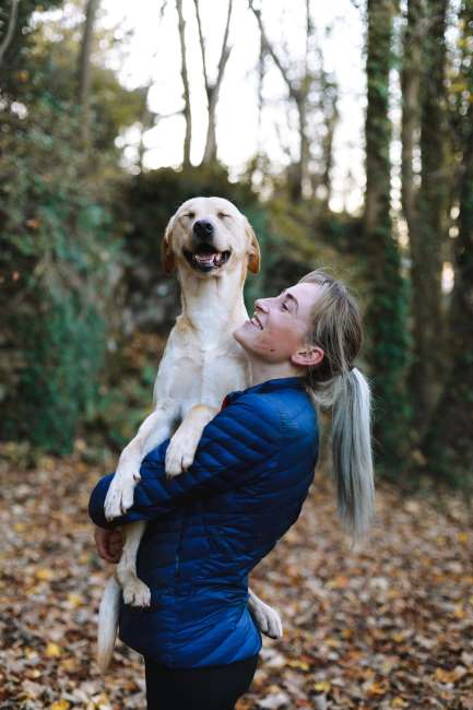 woman with dog outdoors