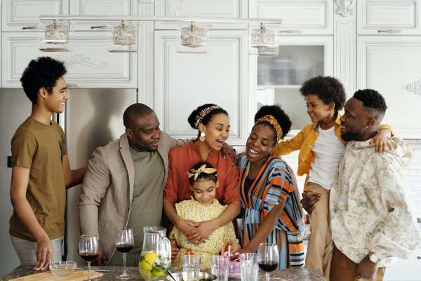 family together in kitchen