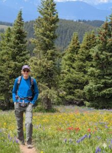 Steve Silver Colorado mortgage broker hiking in Vail wildflower meadow