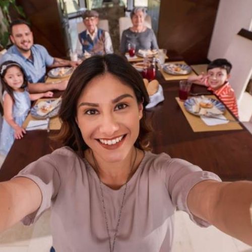 Florida mortgage broker Steve Silver with happy family clients celebrating home purchase in Florida